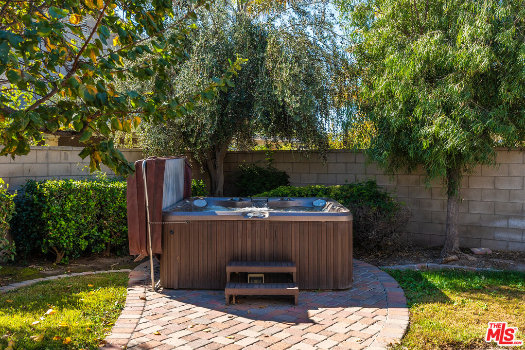 14775 Prairie Smoke Road Eastvale, CA 92880 - Photo 29 of 36 a view of backyard with seating space and trees