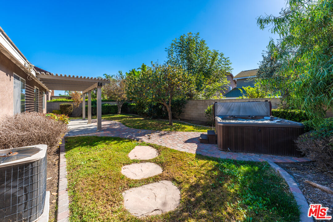 14775 Prairie Smoke Road Eastvale, CA 92880 - Photo 30 of 36 a view of a swimming pool with a patio