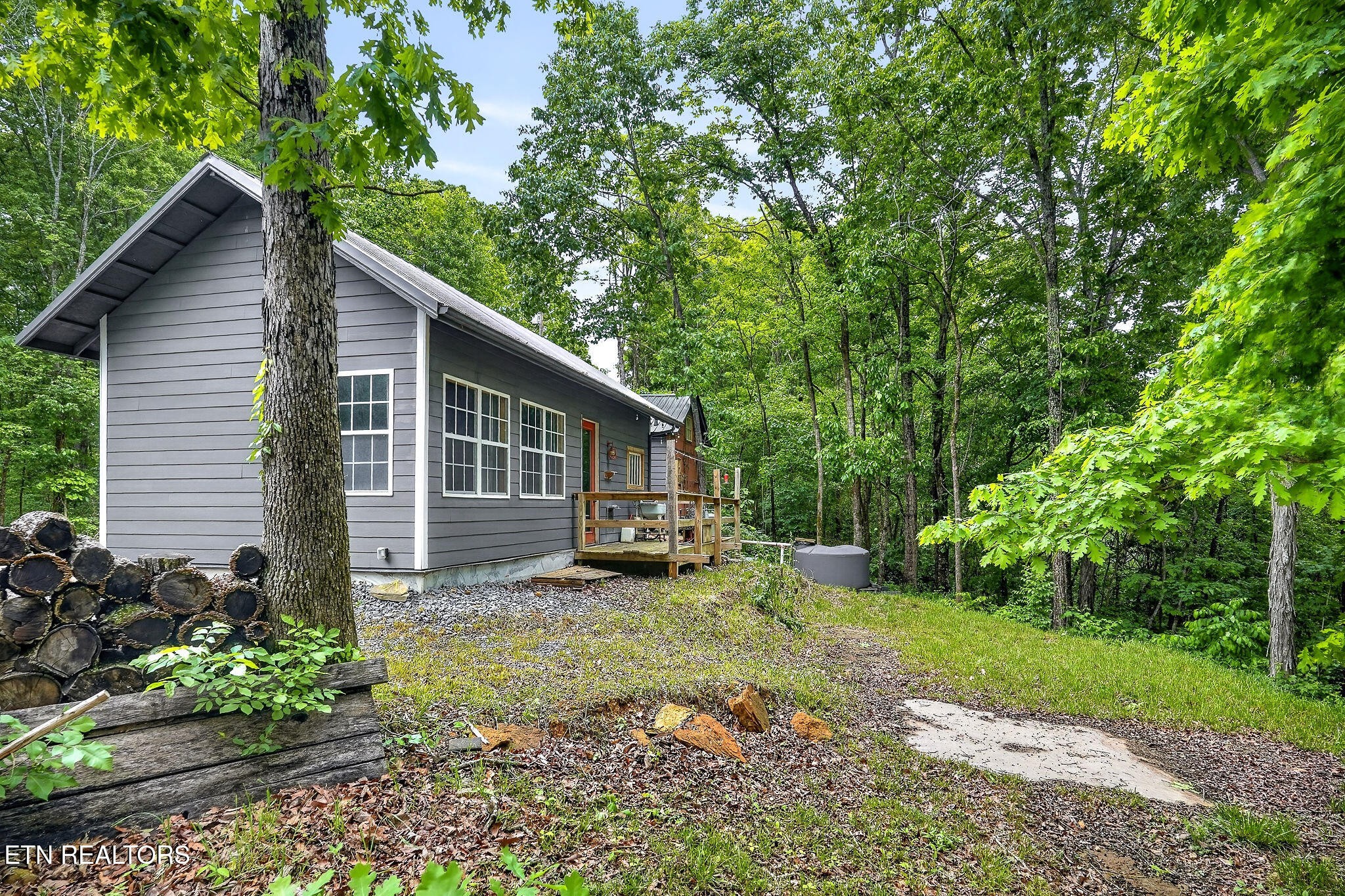 853 Rock Springs Road Celina, TN 38551 - Photo 20 of 21 a view of a house with a yard