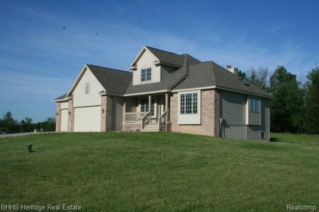 1207 North Nicholson Road Fowlerville, MI 48836 - Photo 3 of 21 Front/Side