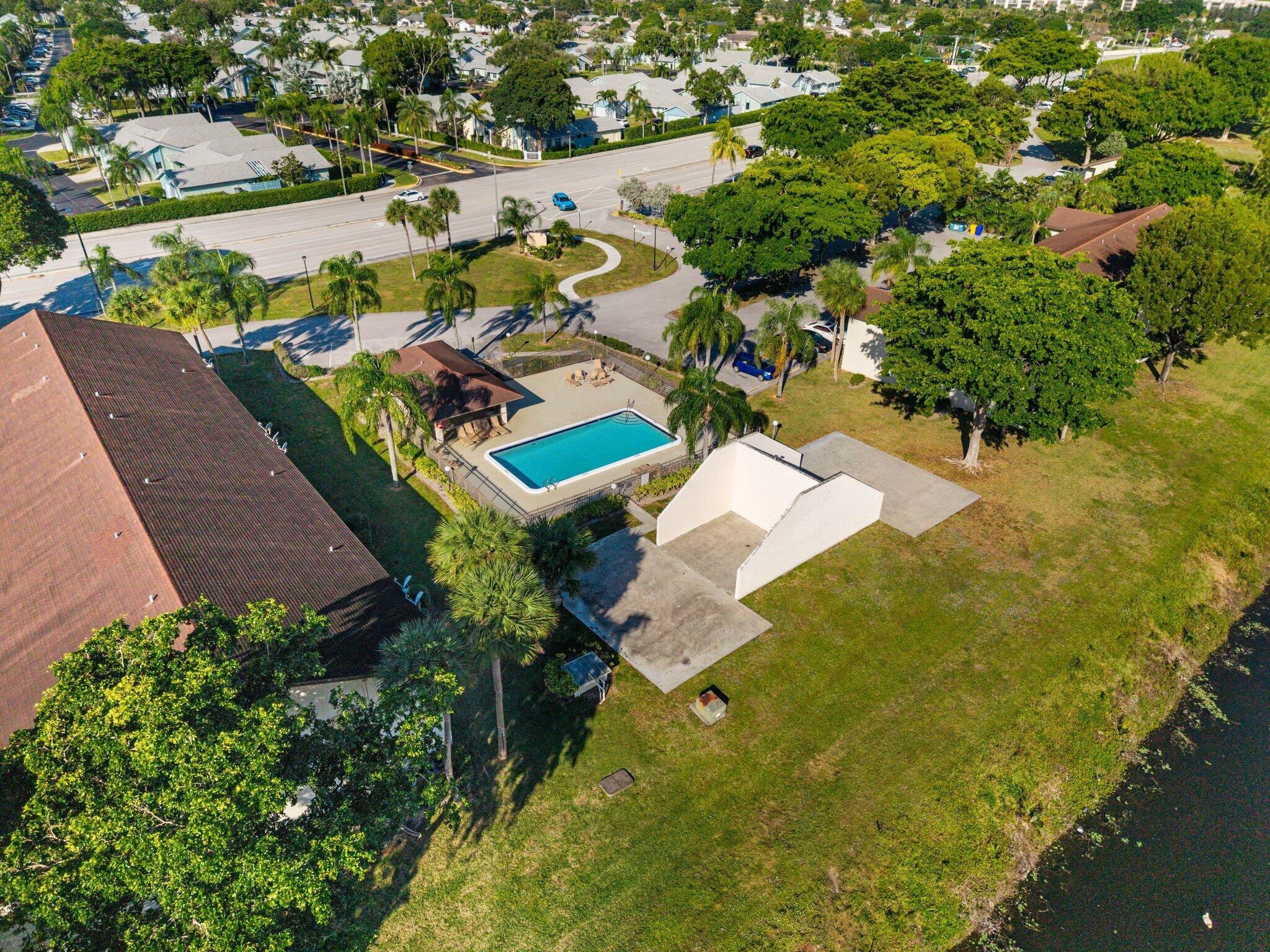 23490 Lyons Road, Unit 605 Boca Raton, FL 33428 - Photo 37 of 39 an aerial view of residential houses with outdoor space