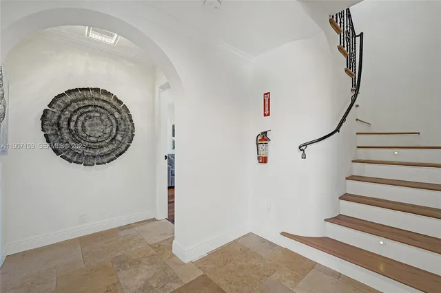 a bathroom with a toilet sink and shower