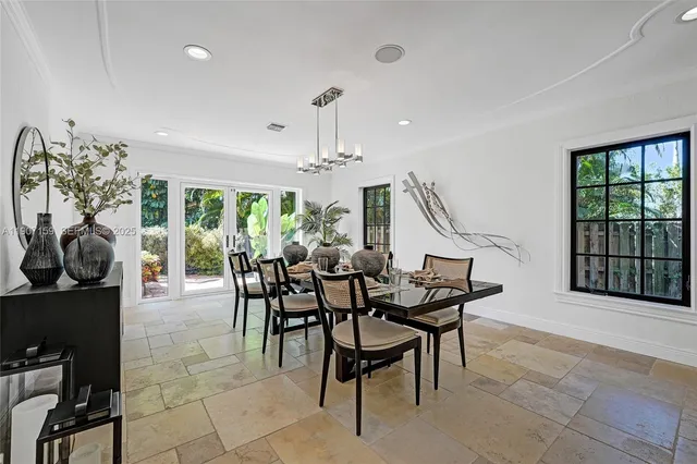 a spacious bedroom with a bed and a flat screen television