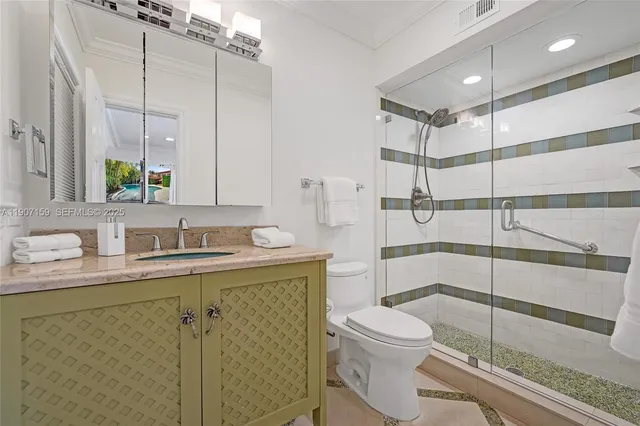 a city view from balcony with seating space