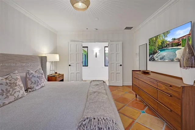 a room with lots of furniture and wooden floor