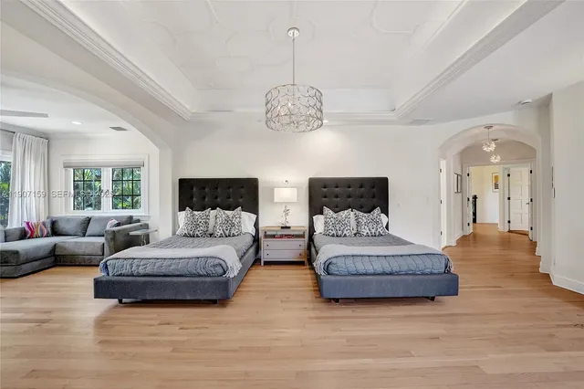 a close view of a stove top oven and cabinets