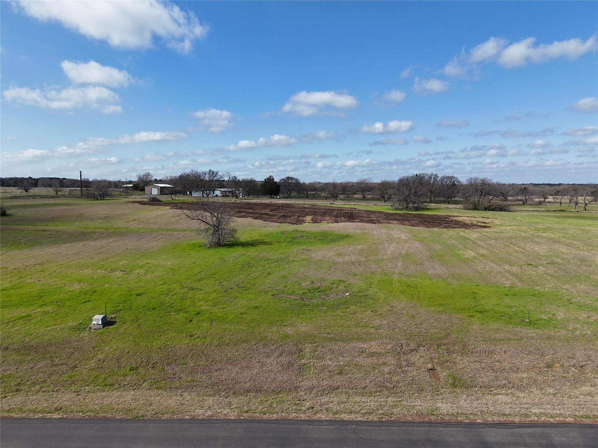 21 Open Water Way Streetman, TX 75859 - Photo 12 of 14 a view of an ocean with beach