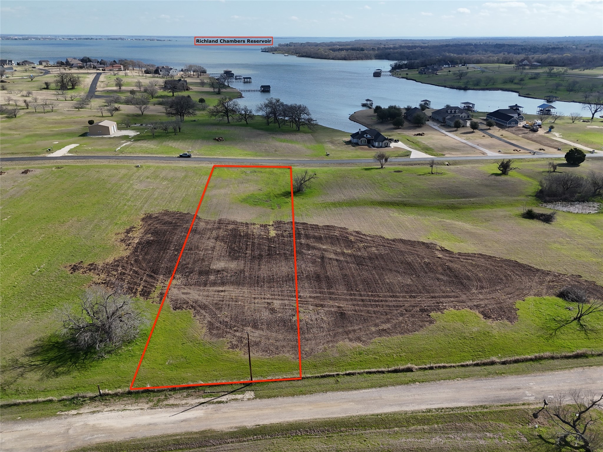 21 Open Water Way Streetman, TX 75859 - Photo 3 of 14 a view of a lake with houses