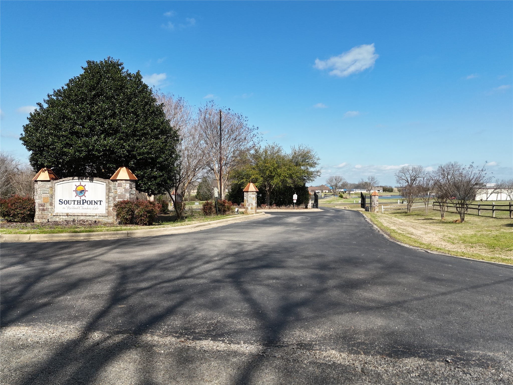 21 Open Water Way Streetman, TX 75859 - Photo 8 of 14 a view of road with large trees