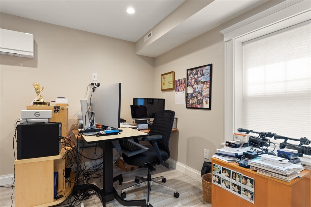 125 Heath Street Somerville, MA 02145 - Photo 35 of 42 a view of a workspace with furniture