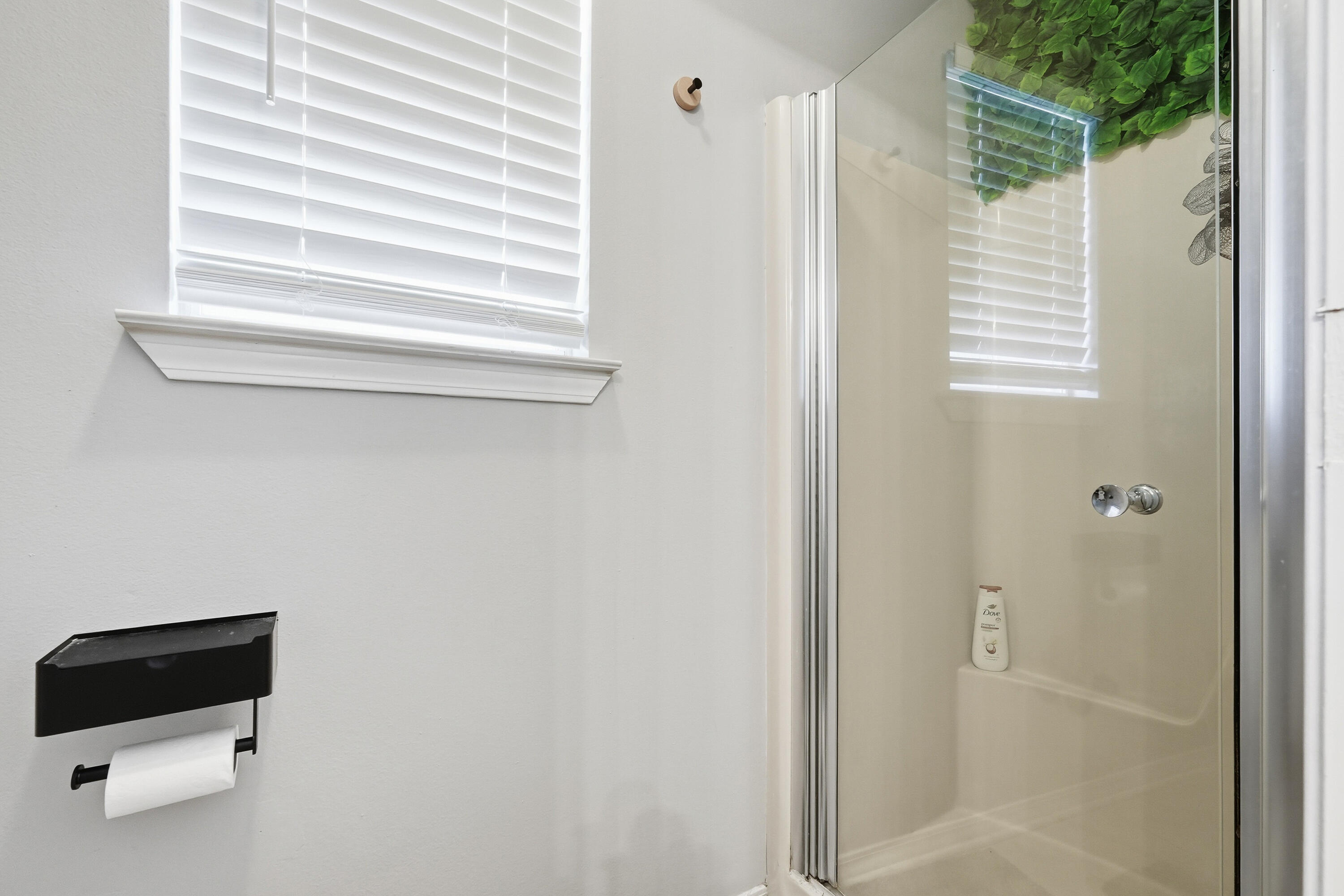 428 Sandy Ridge Circle Mary Esther, FL 32569 - Photo 18 of 44 a bathroom with a window and a shower