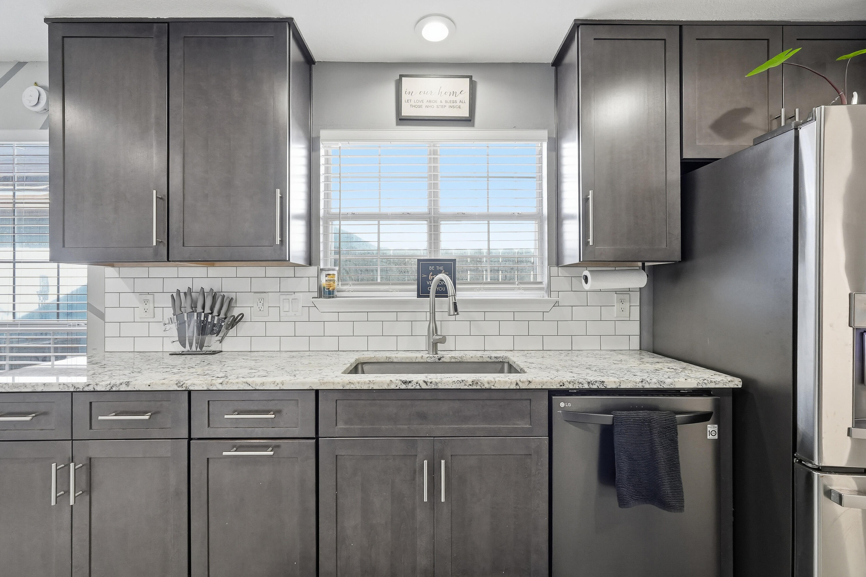 428 Sandy Ridge Circle Mary Esther, FL 32569 - Photo 32 of 44 a kitchen with stainless steel appliances granite countertop a sink and a cabinets