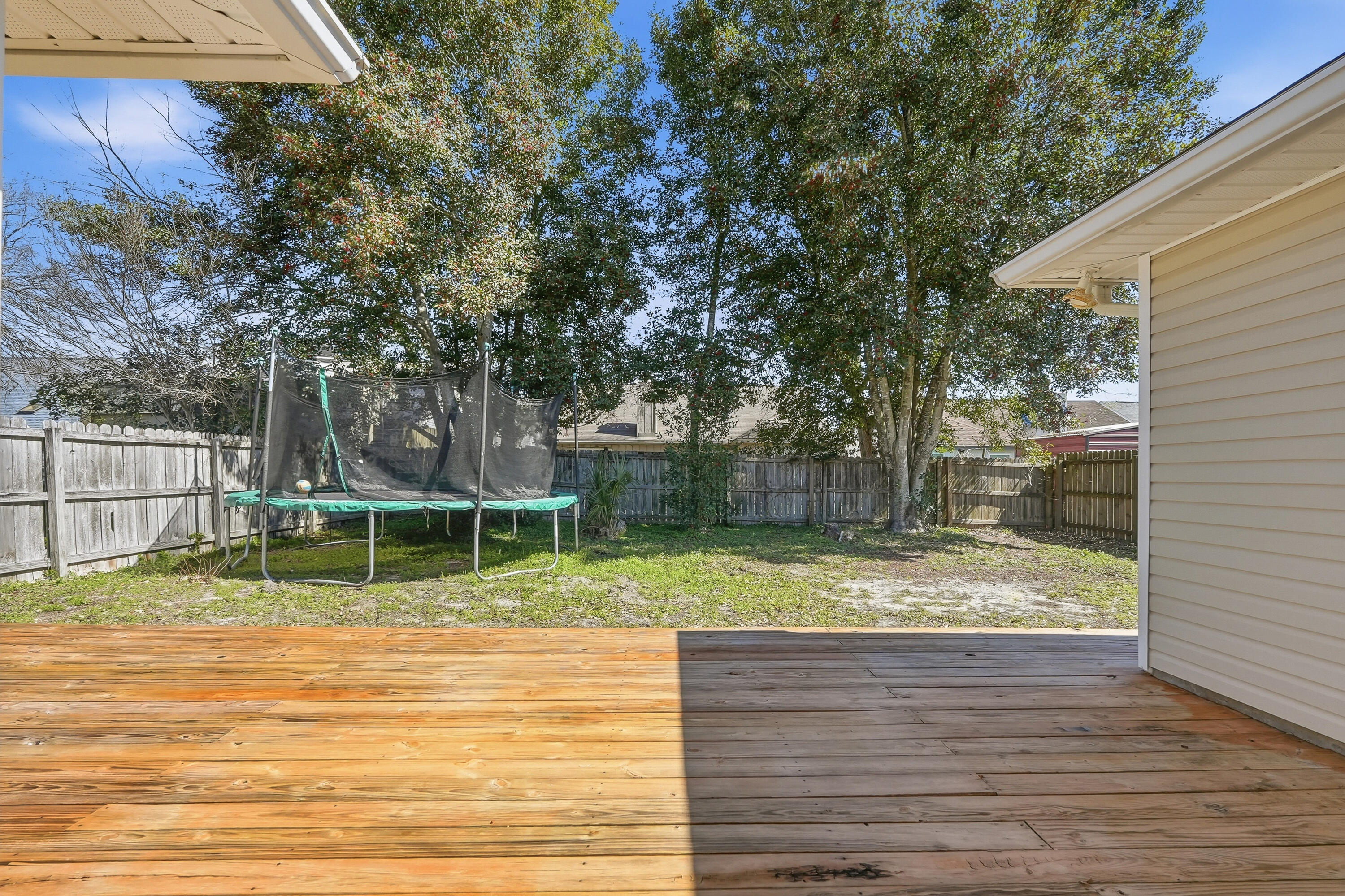 428 Sandy Ridge Circle Mary Esther, FL 32569 - Photo 37 of 44 a view of a yard with large tree