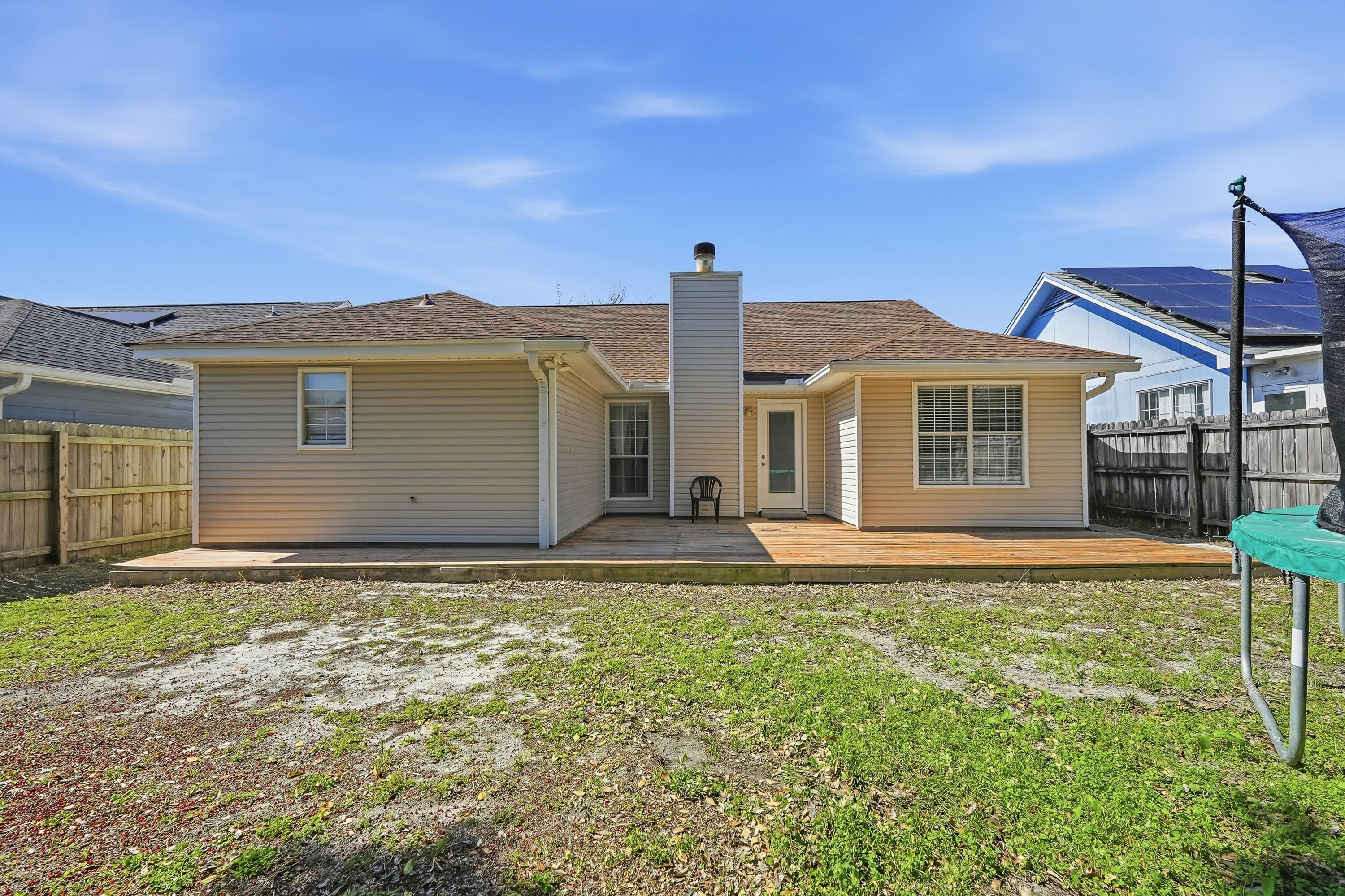 428 Sandy Ridge Circle Mary Esther, FL 32569 - Photo 38 of 44 a front view of a house with a garden