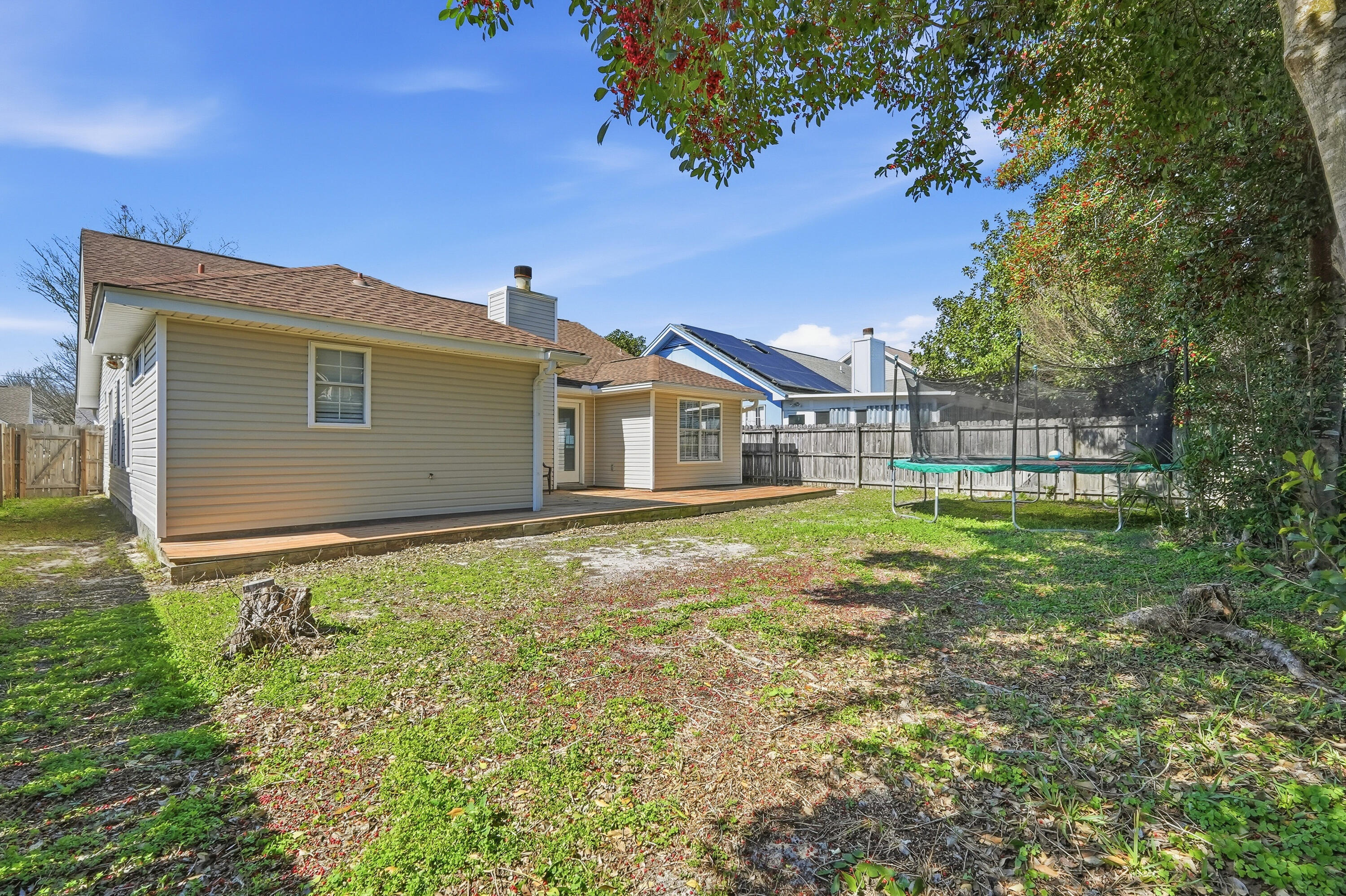 428 Sandy Ridge Circle Mary Esther, FL 32569 - Photo 39 of 44 a view of a house with backyard and sitting area