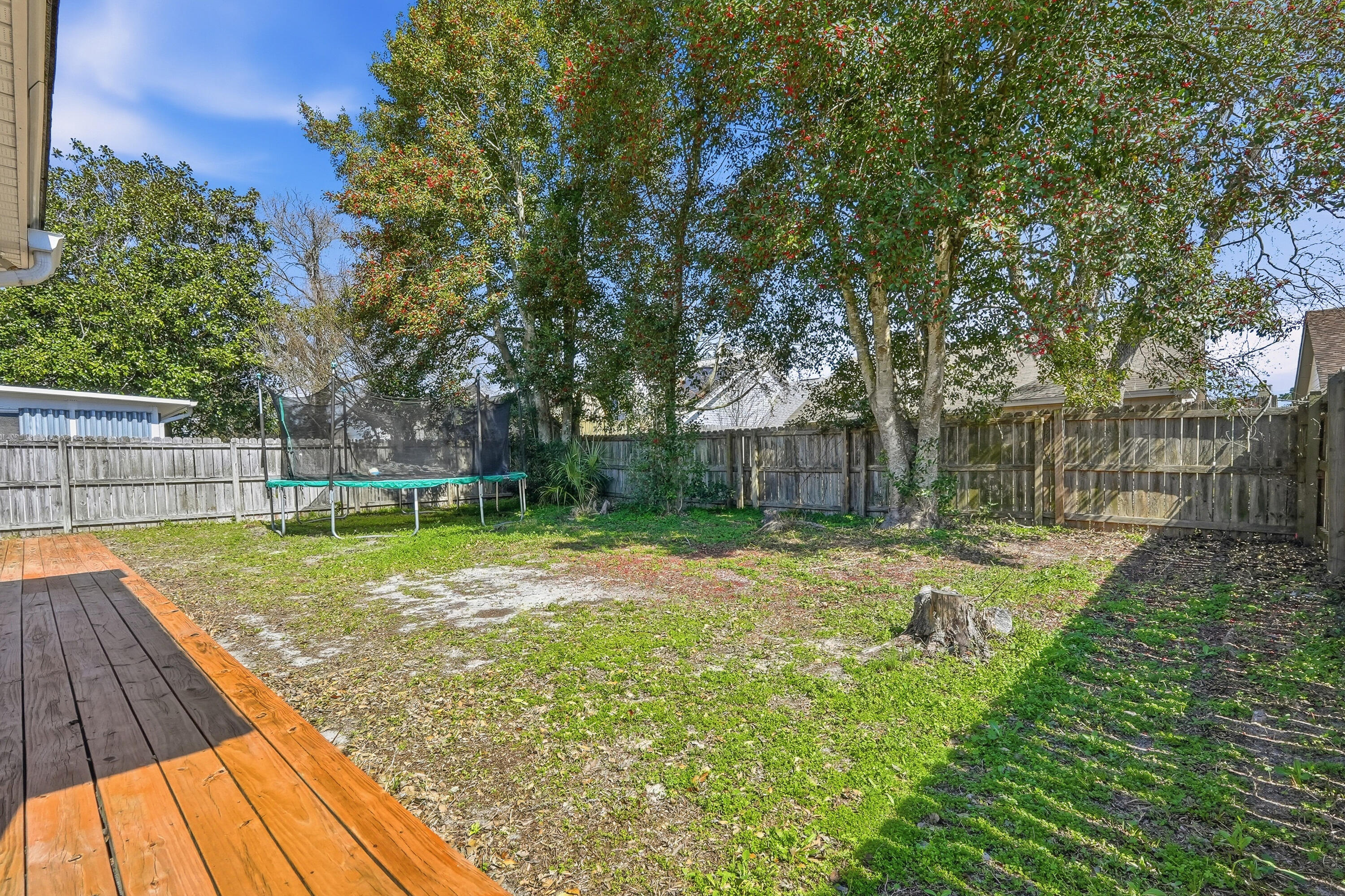 428 Sandy Ridge Circle Mary Esther, FL 32569 - Photo 40 of 44 a view of a backyard with large trees