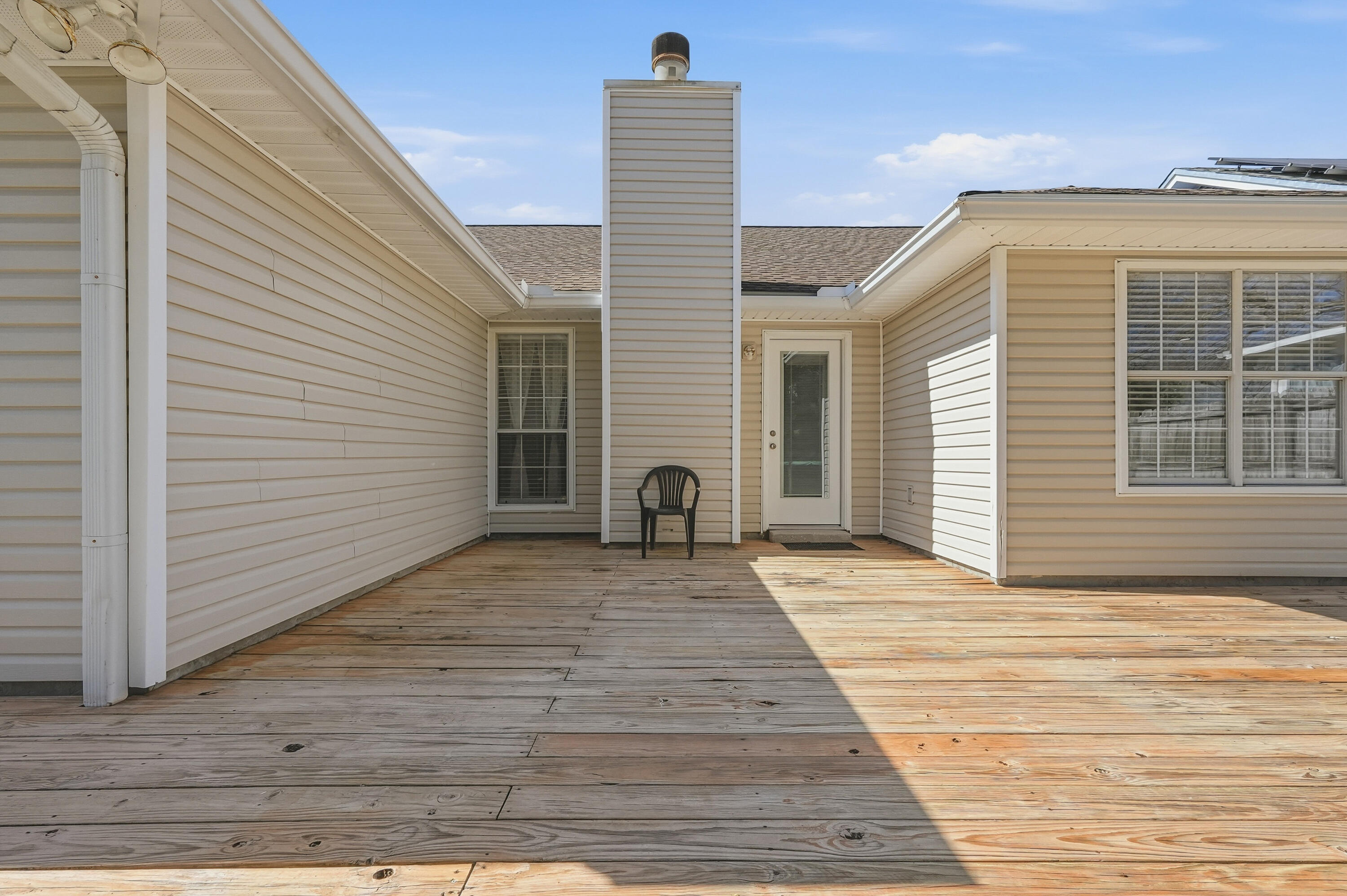 428 Sandy Ridge Circle Mary Esther, FL 32569 - Photo 41 of 44 a view of a house with a roof deck