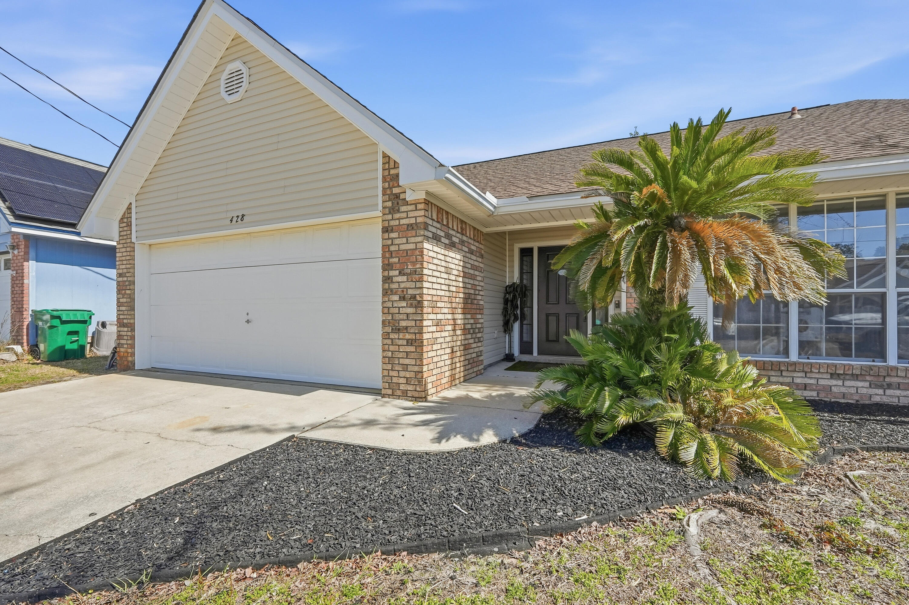 428 Sandy Ridge Circle Mary Esther, FL 32569 - Photo 5 of 44 a view of a house with a yard