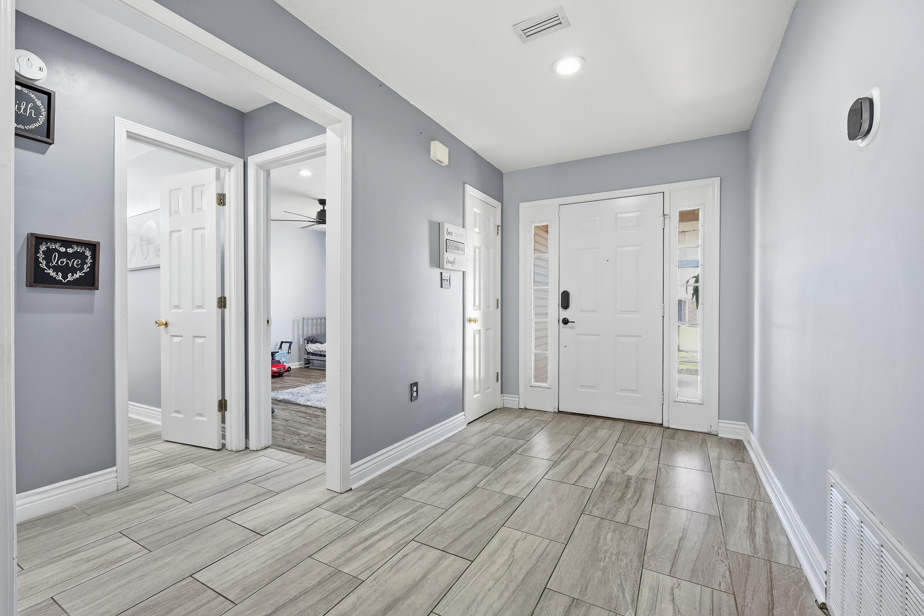 428 Sandy Ridge Circle Mary Esther, FL 32569 - Photo 8 of 44 a view of hallway with wooden floor