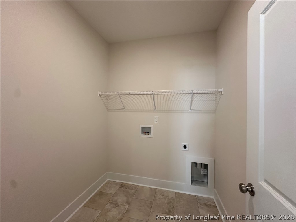 2908 Calloway Road Raeford, NC 28376 - Photo 8 of 25 a view of a room with racks on the wall