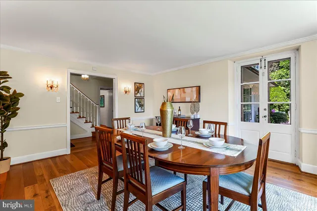 a kitchen with stainless steel appliances granite countertop a stove and a refrigerator