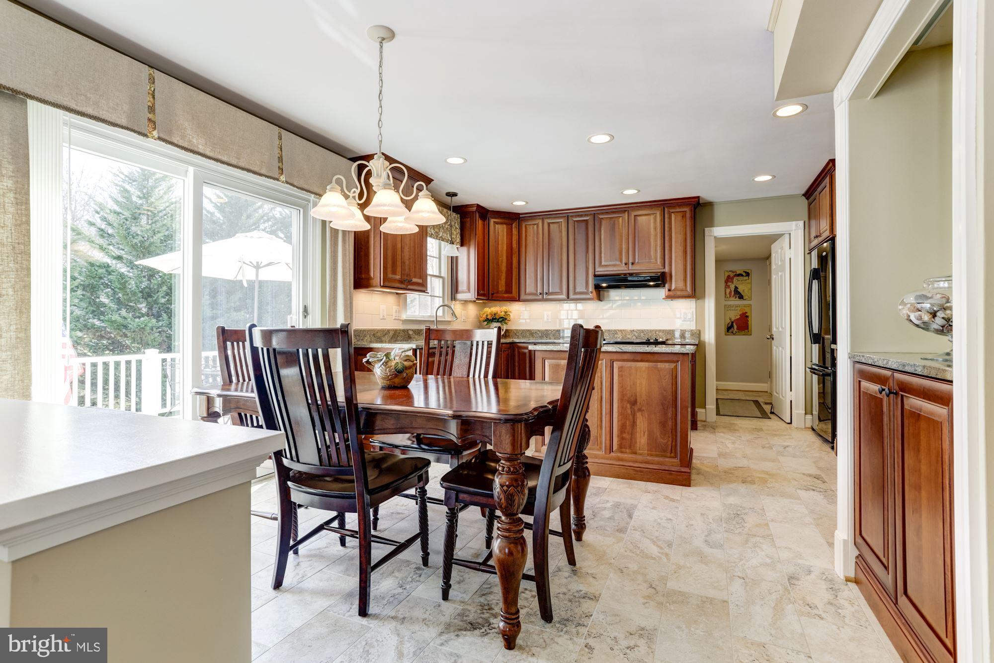 4926 Harrogate Road Ellicott City, MD 21043 - Photo 13 of 52 Large Sunny Breakfast Room w/Built-in Bar Area