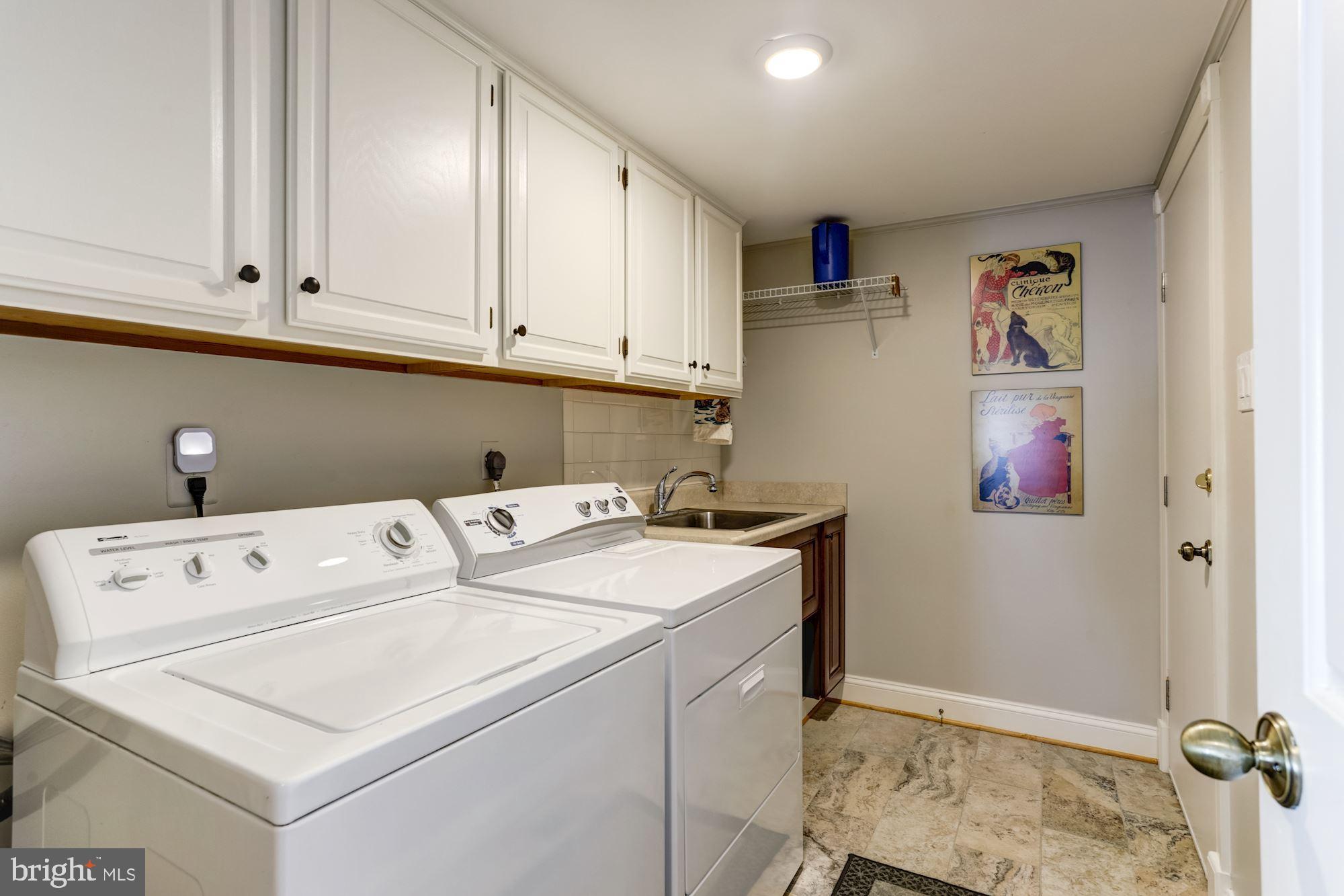 4926 Harrogate Road Ellicott City, MD 21043 - Photo 24 of 52 Main Level Laundry Rm w/Sink & Cabinet Storage