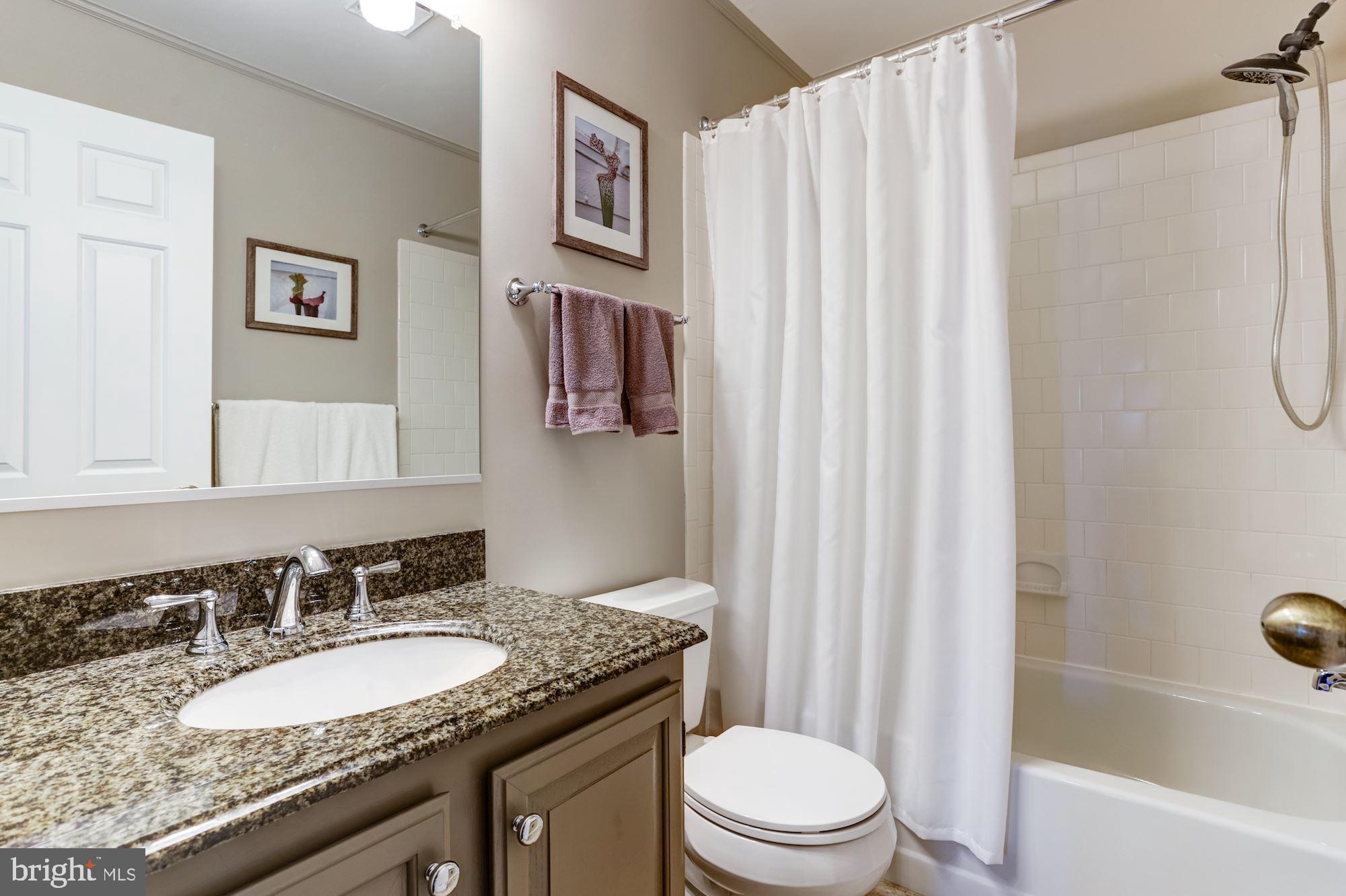 4926 Harrogate Road Ellicott City, MD 21043 - Photo 44 of 52 Hall Bath w/Granite Top Vanity & Tiled Floor &Tub
