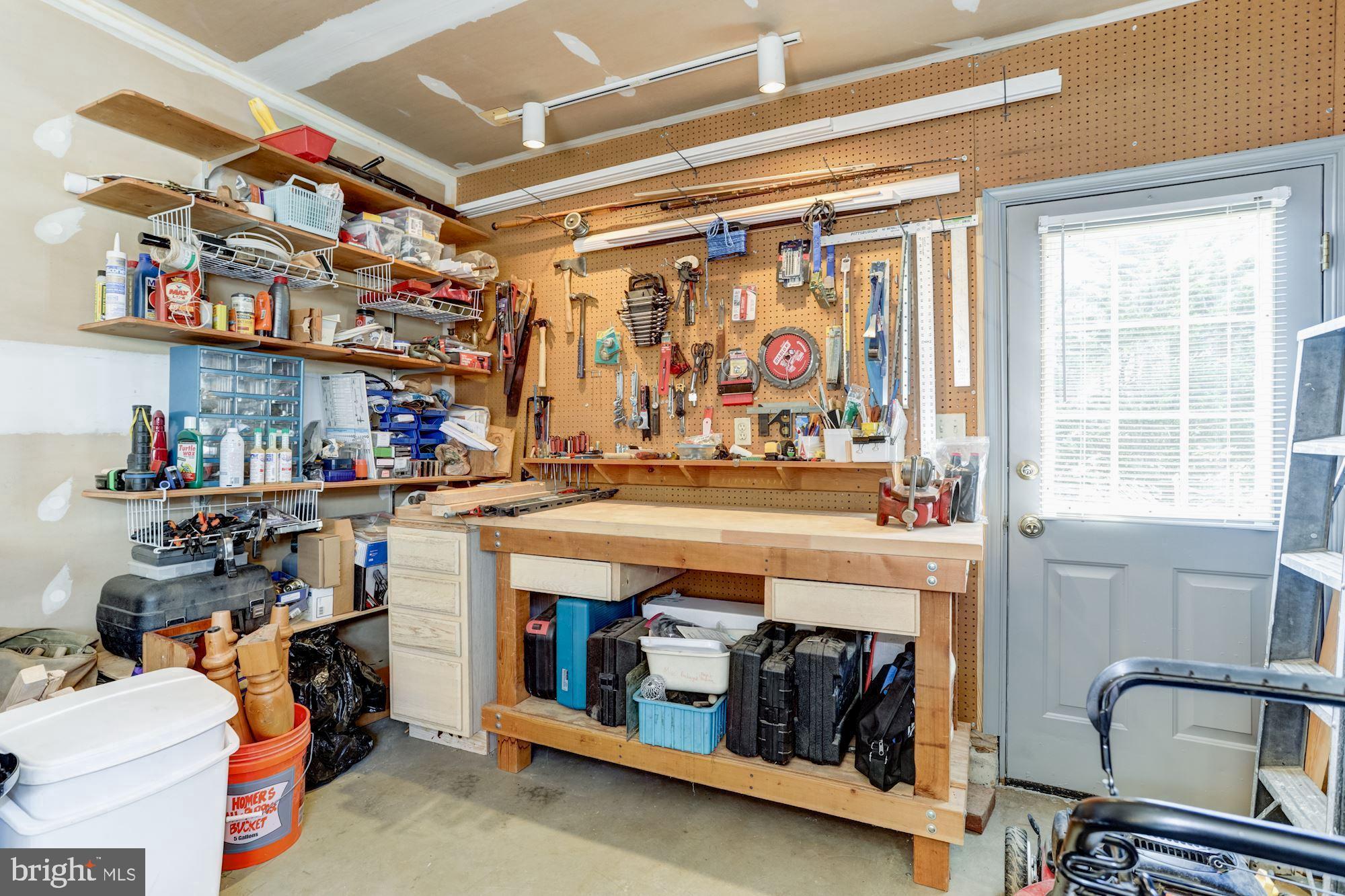 4926 Harrogate Road Ellicott City, MD 21043 - Photo 52 of 52 12'x 6' Workshop Area in Garage w/Separate Entry