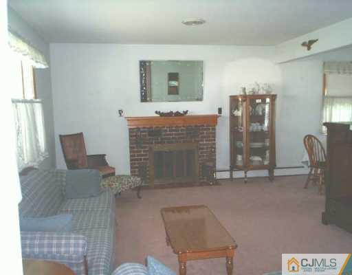 441 Crows Mill Road Fords, NJ 08863 - Photo 4 of 5 a view of living room filled with furniture and window