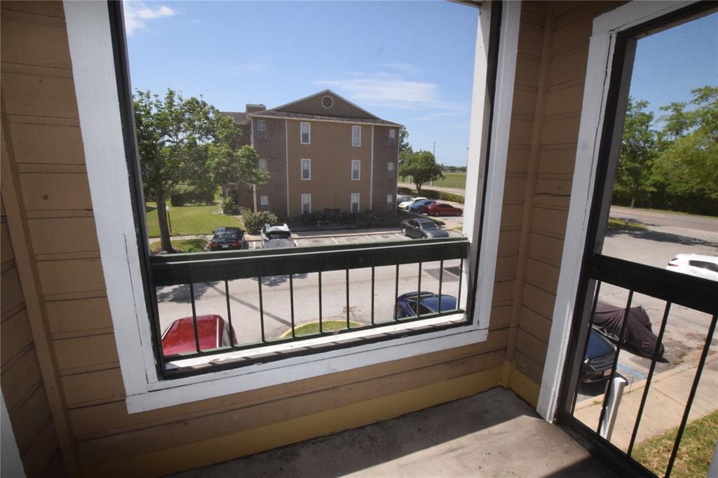 5533 Chrishire Way, Unit F201 Orlando, FL 32822 - Photo 3 of 12 a view of a balcony
