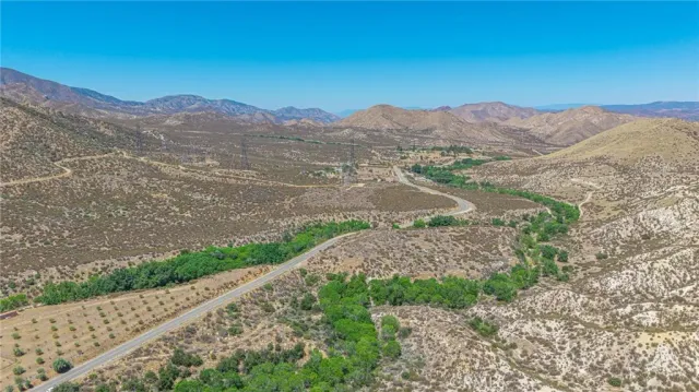 a view of mountains and valleys