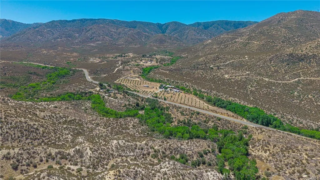 0 Aliso Canyon Acton, CA 93510 - Photo 17 of 34 a view of a dry yard with mountains in the background
