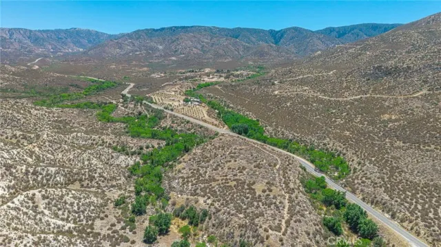 a view of a backyard with green space