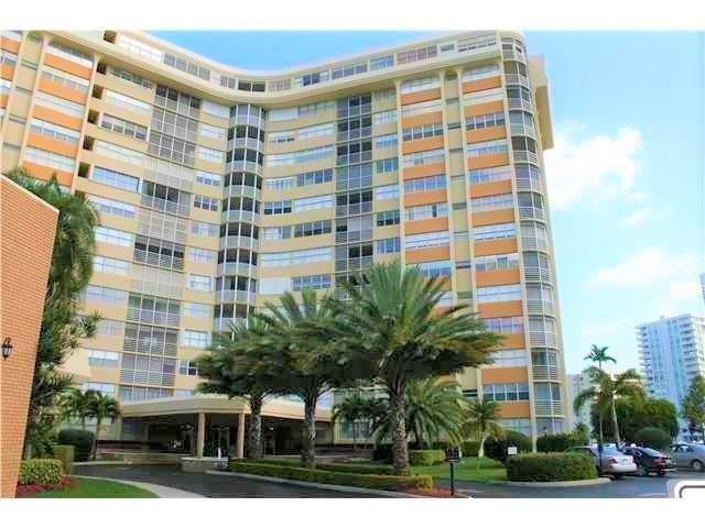 100 Golden Isles Drive, Unit 511 Hallandale Beach, FL 33009 - Photo 1 of 20 a front view of a building