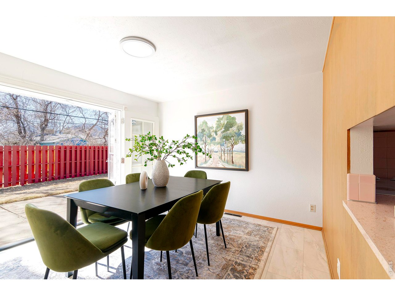 2410 Grape Avenue Boulder, CO 80304 - Photo 14 of 50 Enjoy seamless indoor-outdoor living as the French doors open effortlessly to the backyard.