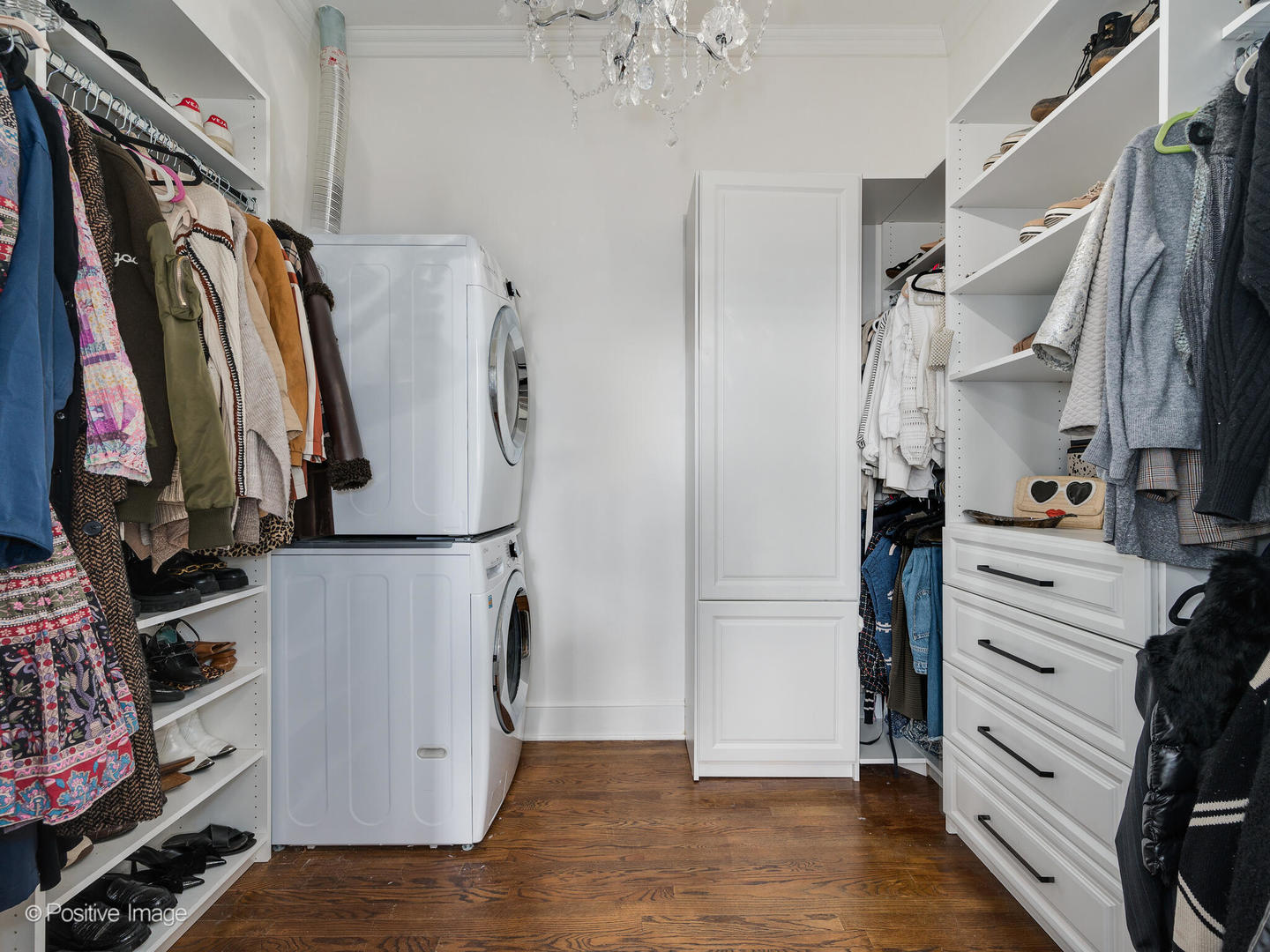 1450 North Dearborn Street, Unit 3A Chicago, IL 60610 - Photo 14 of 17 a view of walk in closet with clothes and shoes
