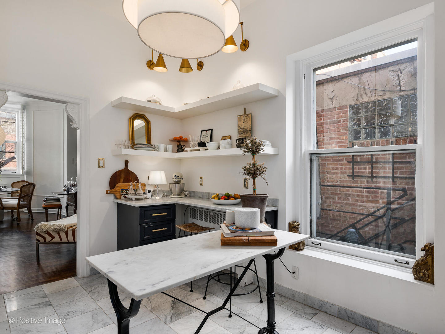 1450 North Dearborn Street, Unit 3A Chicago, IL 60610 - Photo 10 of 17 a kitchen with a table and chairs in it