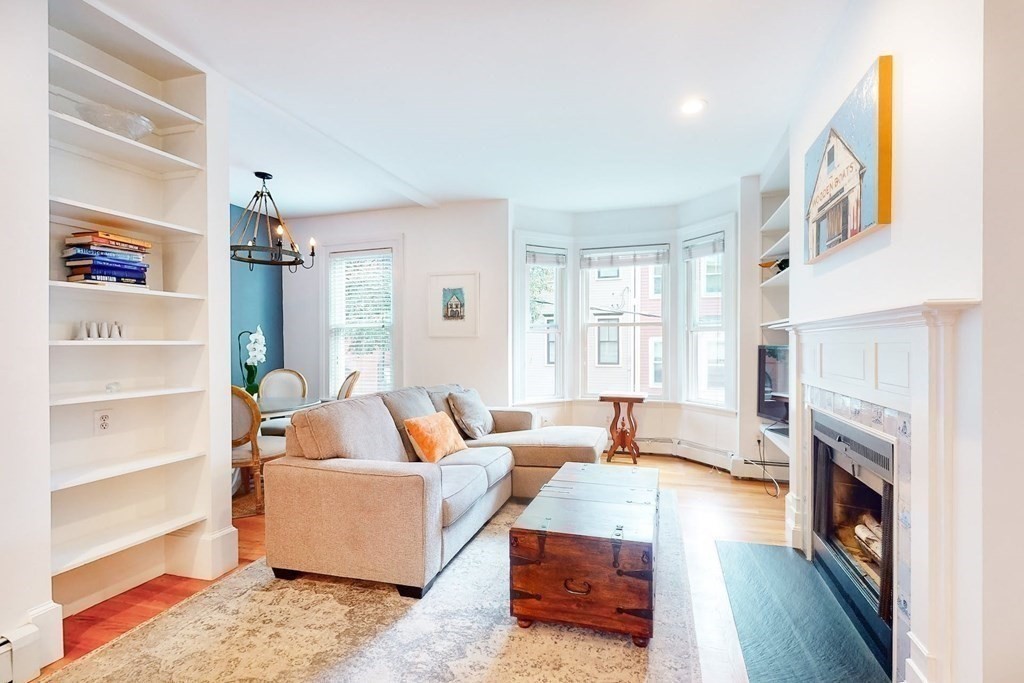 32 Mead Boston Ma, Unit 2 Boston, MA 02129 - Photo 3 of 21 a living room with furniture and a fireplace