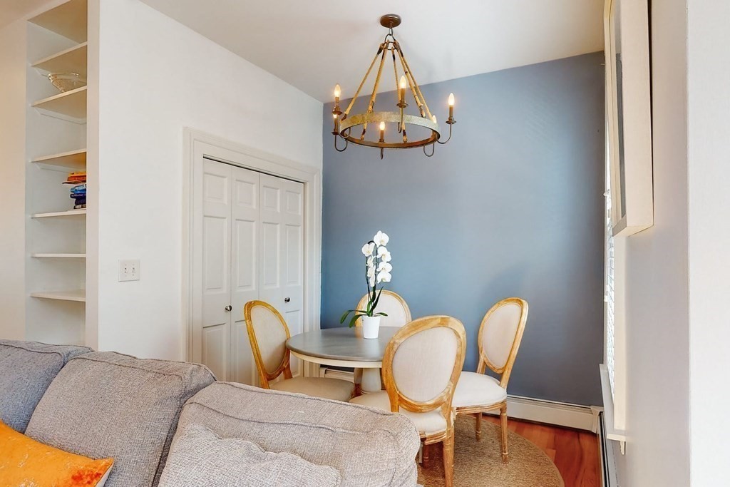 32 Mead Boston Ma, Unit 2 Boston, MA 02129 - Photo 5 of 21 a view of a dining room with furniture and wooden floor