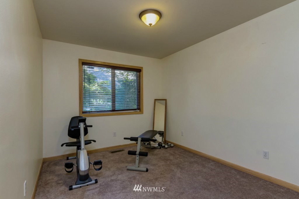 5500 Canvasback Road Blaine, WA 98230 - Photo 14 of 23 a view of a workspace with furniture and a window