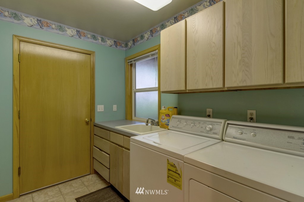 5500 Canvasback Road Blaine, WA 98230 - Photo 15 of 23 a view of storage and utility room with washer and dryer