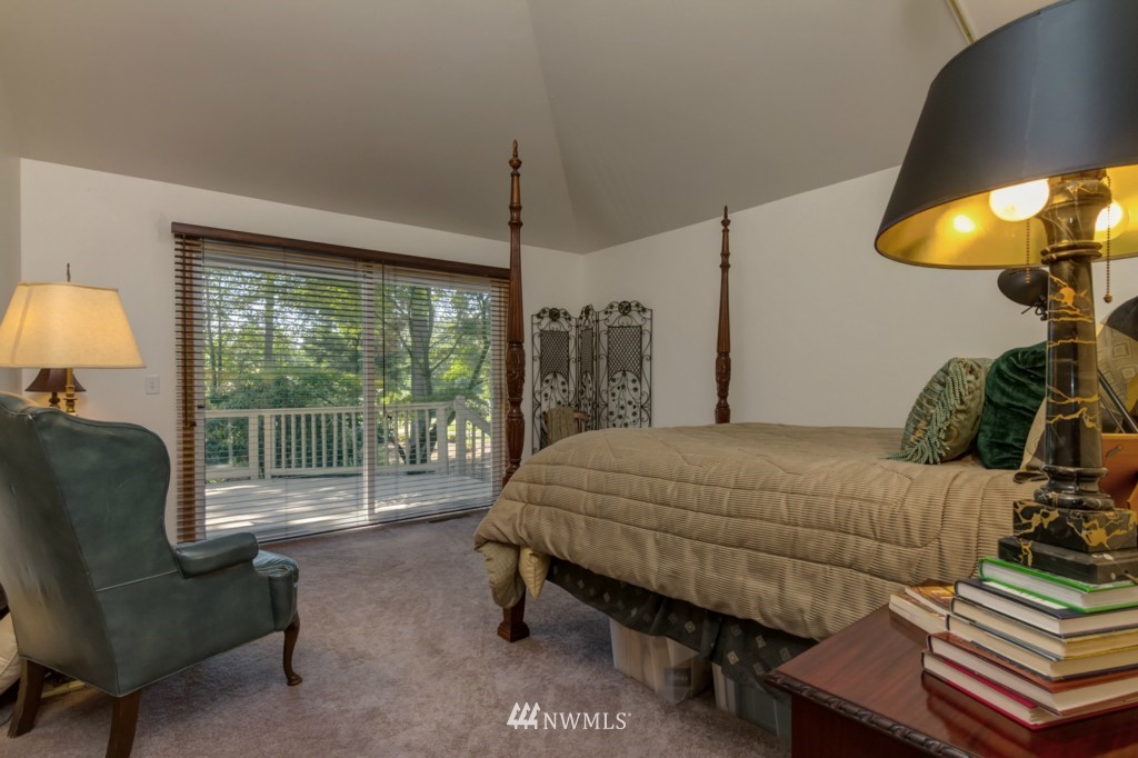 5500 Canvasback Road Blaine, WA 98230 - Photo 17 of 23 a bed sitting in a bedroom next to a window