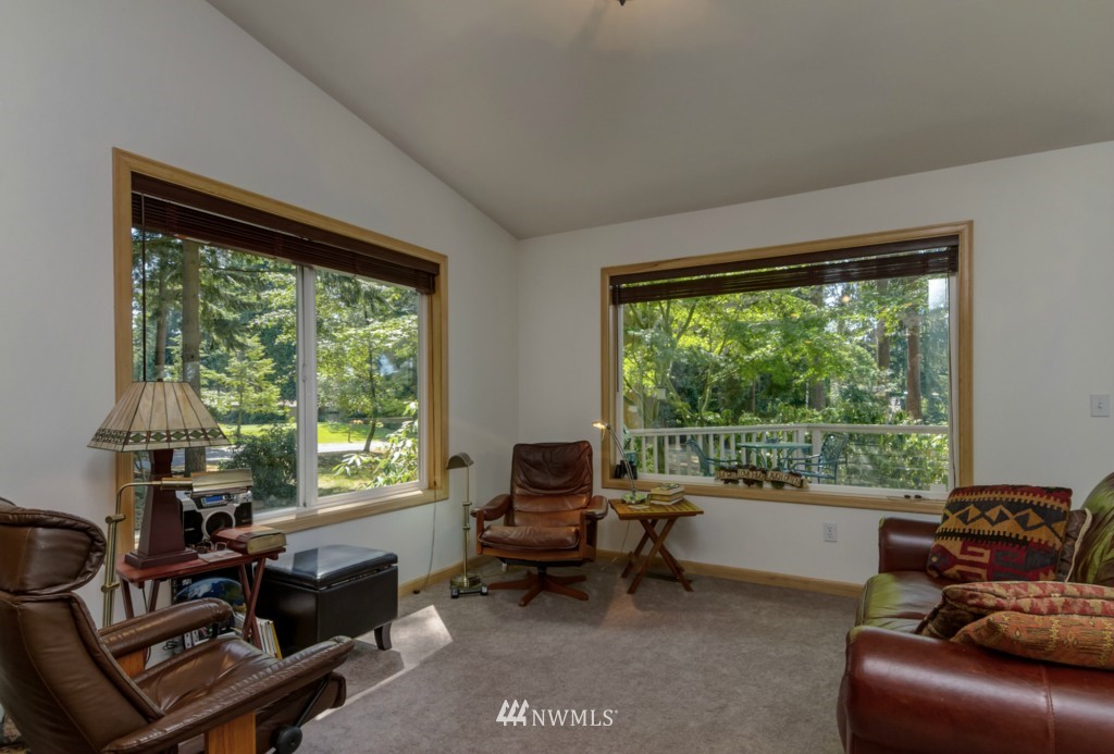 5500 Canvasback Road Blaine, WA 98230 - Photo 5 of 23 a living room with furniture and a floor to ceiling window