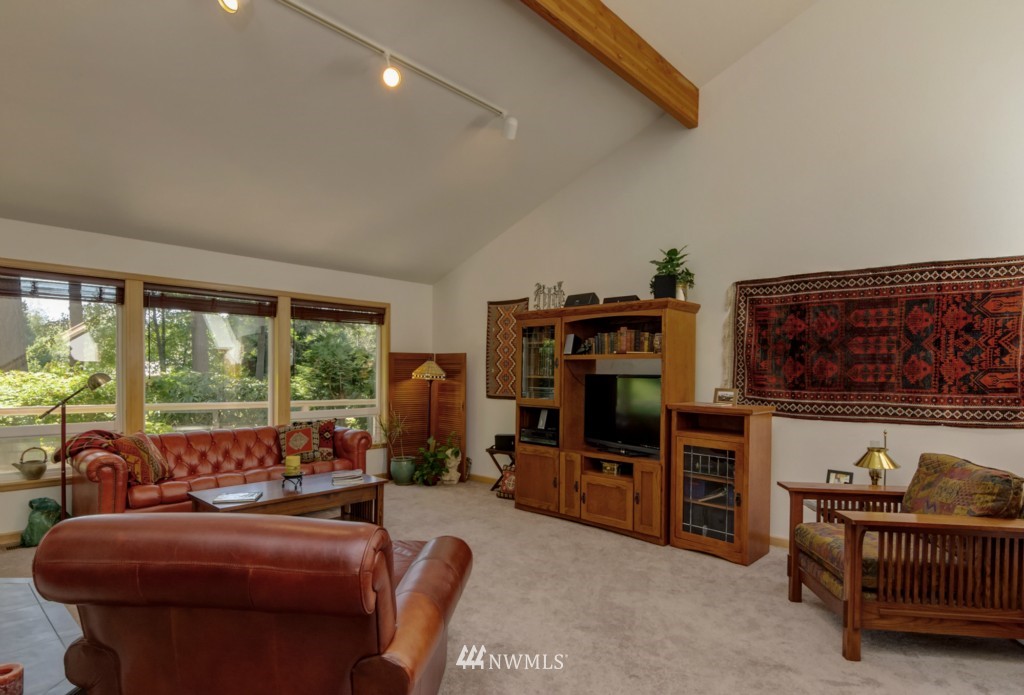 5500 Canvasback Road Blaine, WA 98230 - Photo 6 of 23 a living room with furniture and a flat screen tv