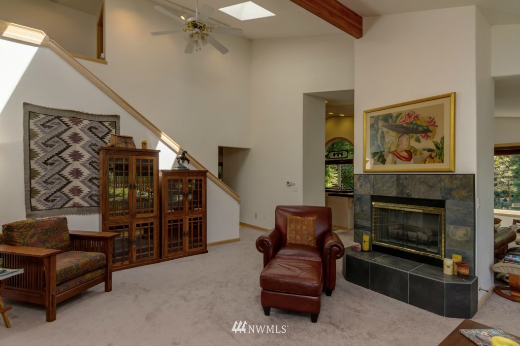 5500 Canvasback Road Blaine, WA 98230 - Photo 7 of 23 a living room with furniture and a fireplace