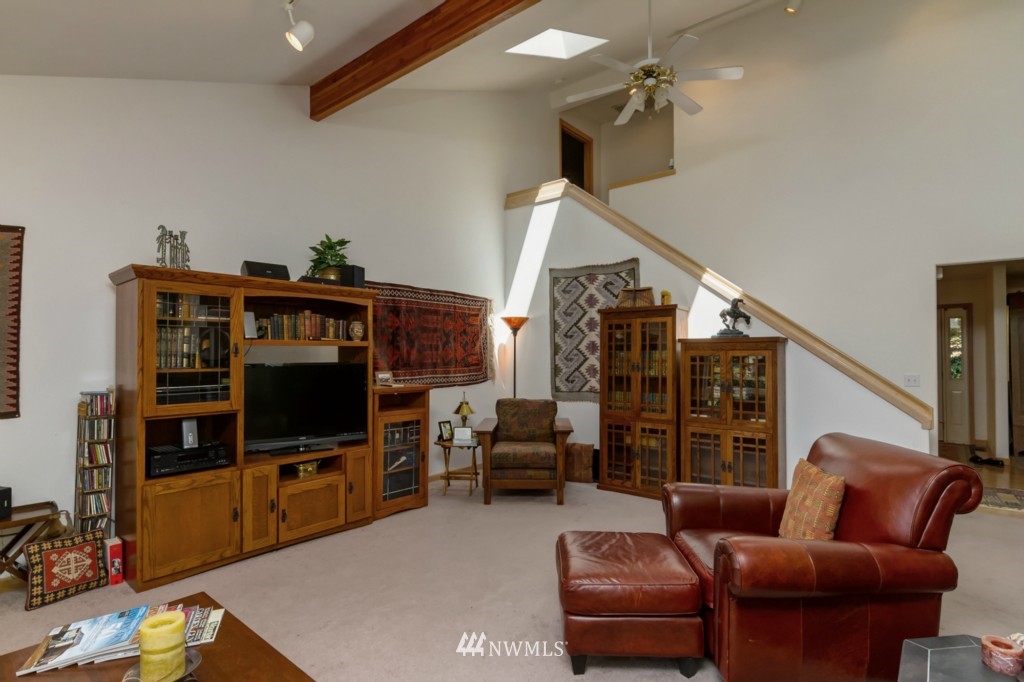 5500 Canvasback Road Blaine, WA 98230 - Photo 8 of 23 a living room with furniture and a flat screen tv