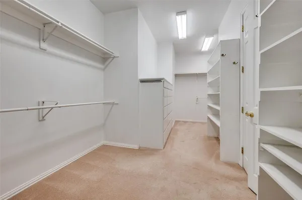 a view of a walk in closet