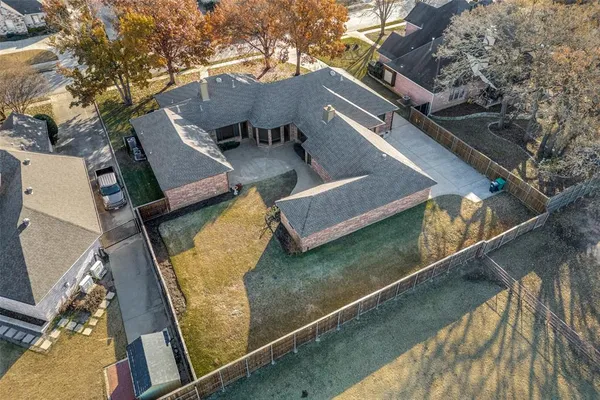 a view of roof deck with patio