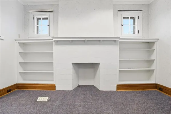 a view of room with closet and racks